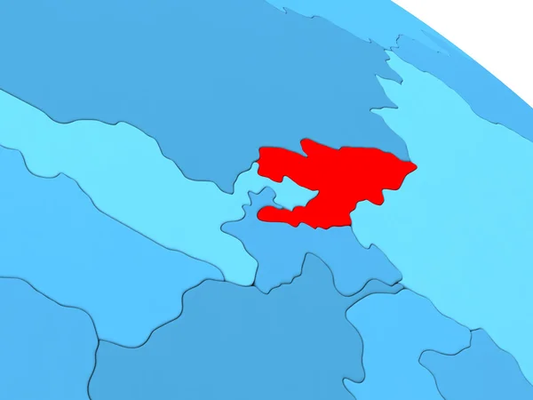 Kyrgyzstan in Rot auf blauem Globus — Stockfoto