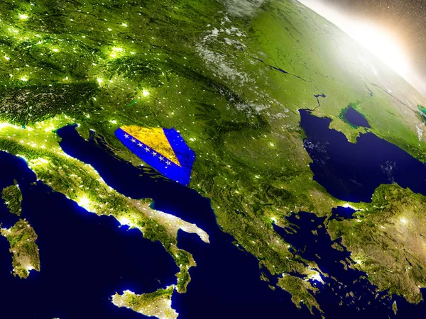 Bosnien mit Fahne in aufgehender Sonne lizenzfreie Stockbilder