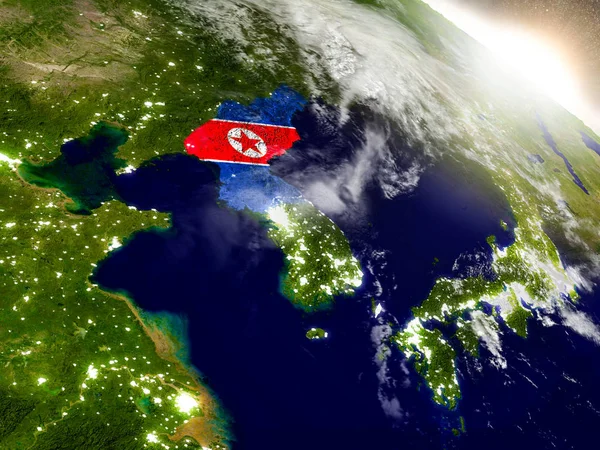 Nordkorea med flaggan i stigande solen — Stockfoto