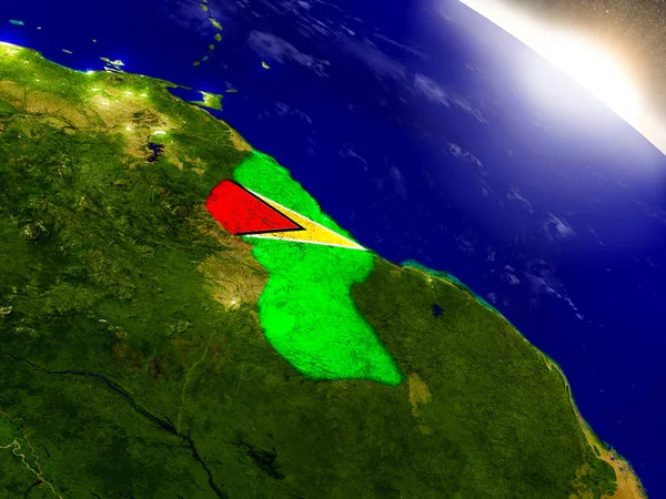 Guyana med flaggan i stigande solen Royaltyfria Stockfoton