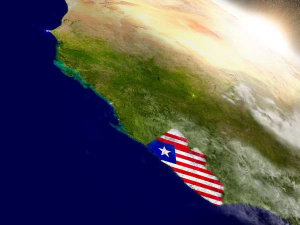 Liberia med flaggan i stigande solen — Stockfoto