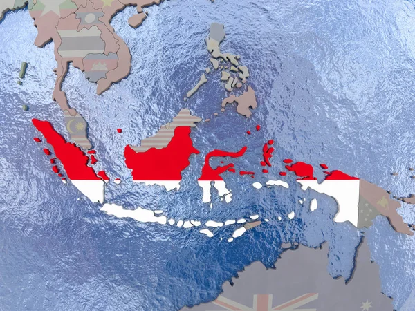Indonésie s vlajkou na zeměkouli — Stock fotografie