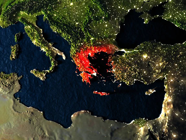 Греції в червоний колір з космосу вночі — стокове фото