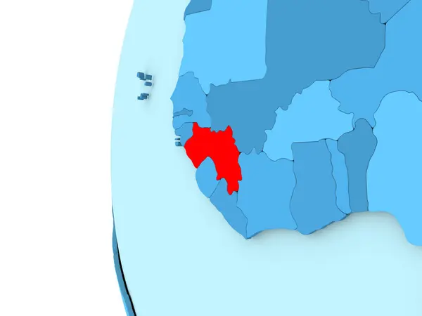 Guinea auf blauem Globus — Stockfoto