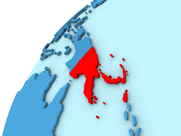Papua-Neuguinea in Rot auf blauem Globus — Stockfoto