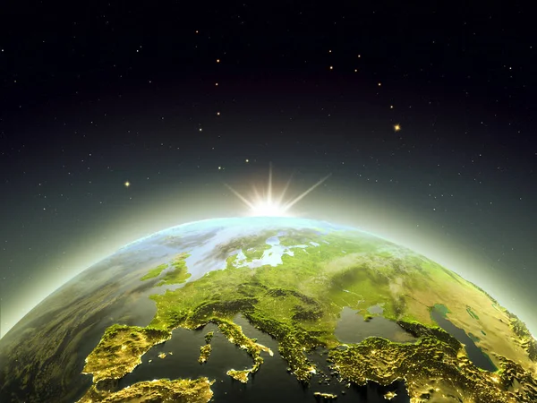 Soluppgång över Europa från rymden Stockfoto
