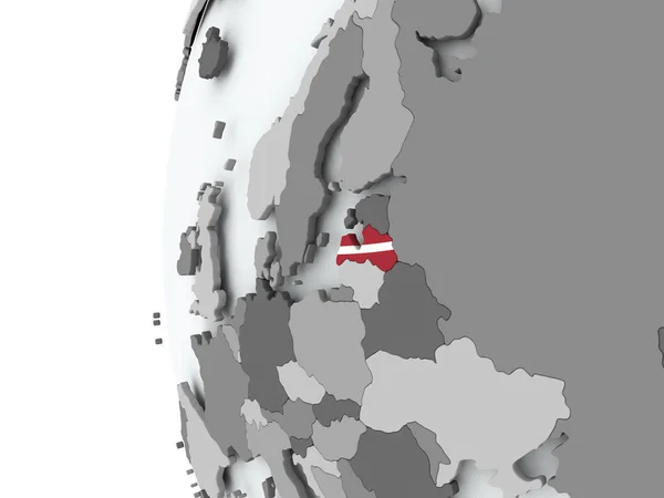 Lettland auf Globus mit Fahne — Stockfoto