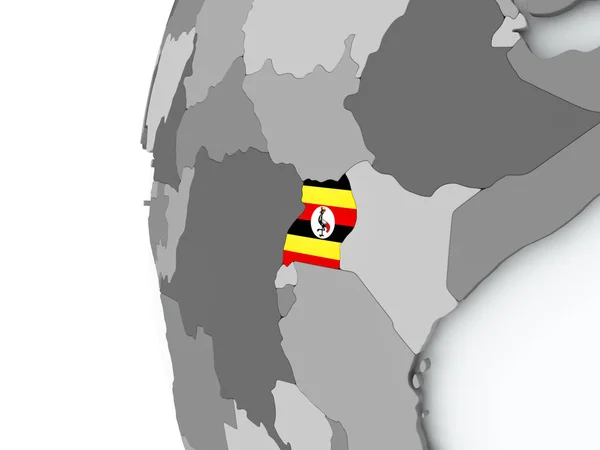 Uganda auf Globus mit Fahne — Stockfoto