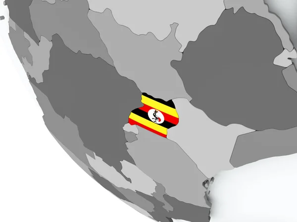 Flagge Ugandas auf politischem Globus — Stockfoto