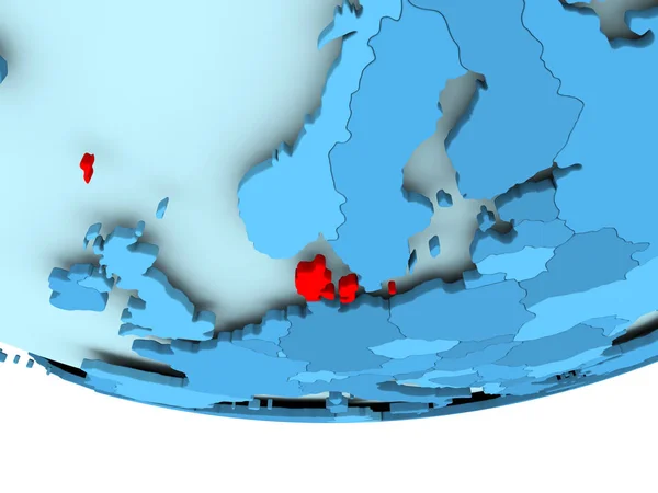 Dánsko v červené barvě na modré mapy — Stock fotografie