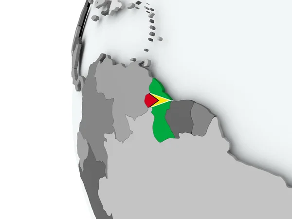 Guyana på jordglob med flagga — Stockfoto