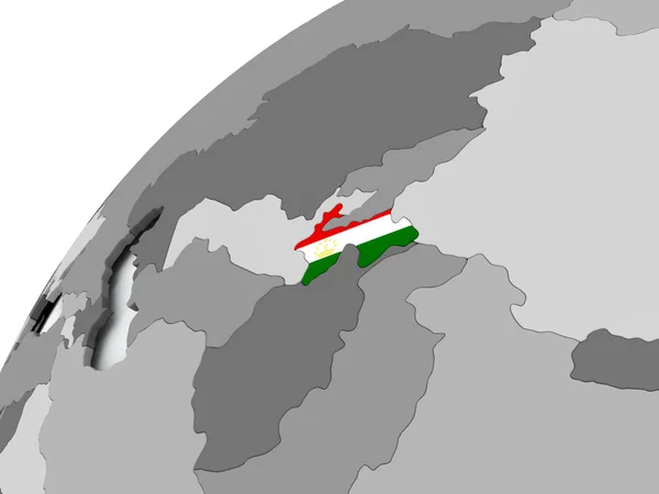 Flaga Tadżykistanu na szary Globus — Zdjęcie stockowe