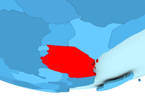 Tanzania in het rood op blauwe kaart — Stockfoto