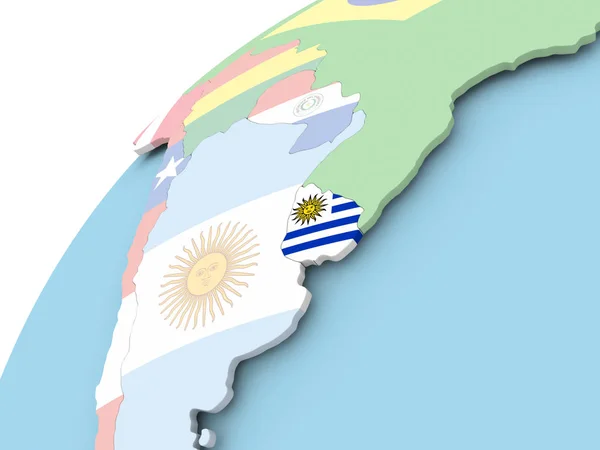 Uruguay op wereldbol met vlag — Stockfoto