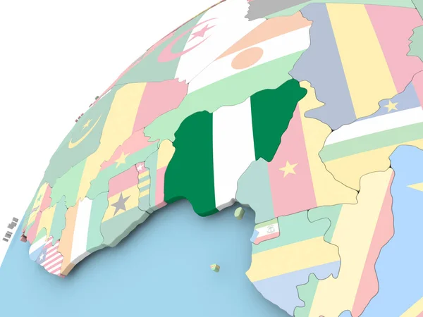 Nigeria på jordglob med flagga — Stockfoto