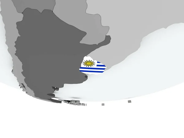 Uruguay mit fahne auf globus — Stockfoto