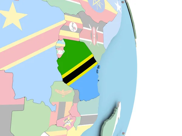 Tanzanie s vlajkou na zeměkouli — Stock fotografie