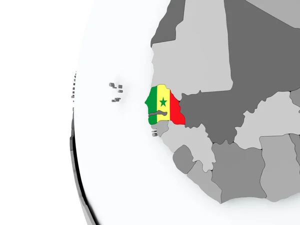 Senegal på jordglob med flagga — Stockfoto