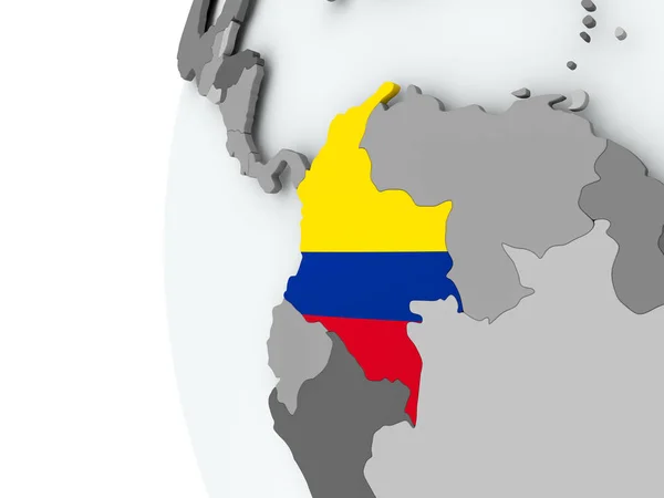 Colombia på jordglob med flagga — Stockfoto