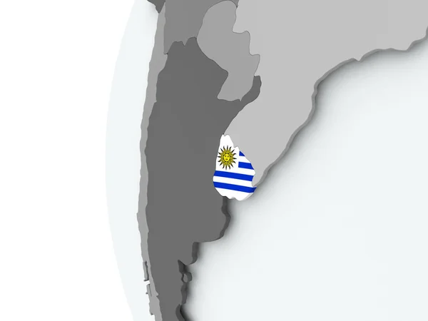 Uruguay op wereldbol met vlag — Stockfoto