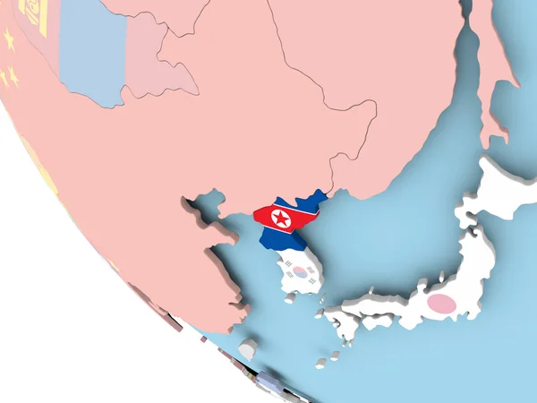 Severní Korea s vlajkou na zeměkouli — Stock fotografie