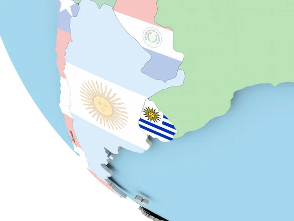 Uruguay met vlag op de wereldbol — Stockfoto