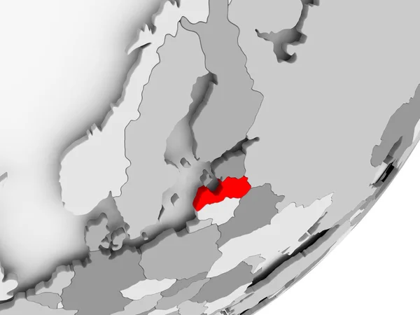 Lotyšsko v červené barvě na šedém mapu — Stock fotografie