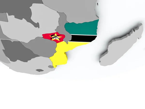 Mozambique met vlag op de wereldbol — Stockfoto