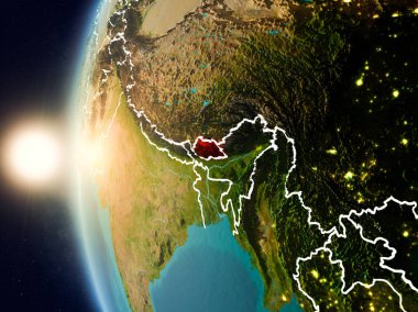 Günbatımı Bhutan uzaydan yukarıda