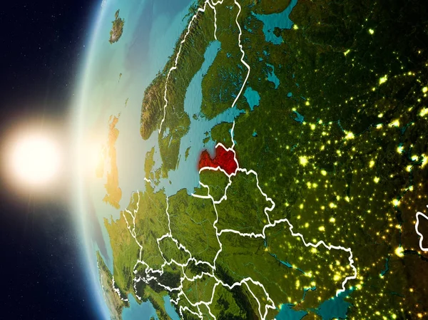 Puesta de sol sobre Letonia desde el espacio — Foto de Stock