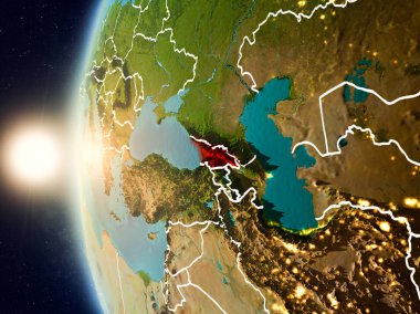 Gürcistan'dan alan yukarıda günbatımı