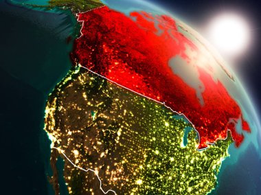 Kanada gündoğumu sırasında uzaydan