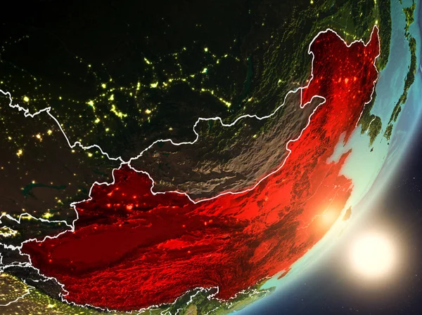 Solen stiger över Kina från rymden Royaltyfria Stockfoton