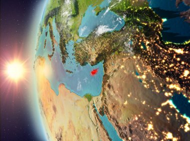 Uzaydan gelen gün batımı sırasında Kıbrıs