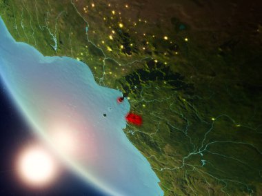 Yeryüzünde günbatımı sırasında Ekvator Ginesi