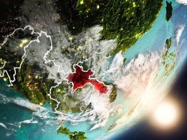 Uzaydan Laos yükselen güneş