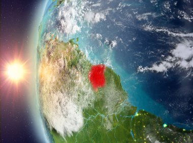 Uzaydan gelen gün batımı sırasında Surinam