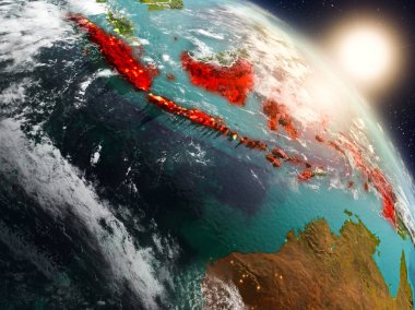 Endonezya gündoğumu sırasında uzaydan