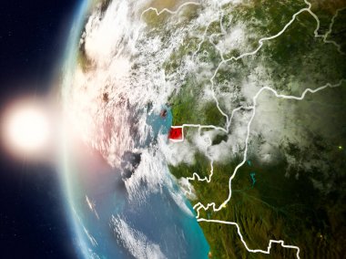 Yeryüzünde günbatımı sırasında Ekvator Ginesi