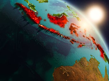 Endonezya gündoğumu sırasında uzaydan