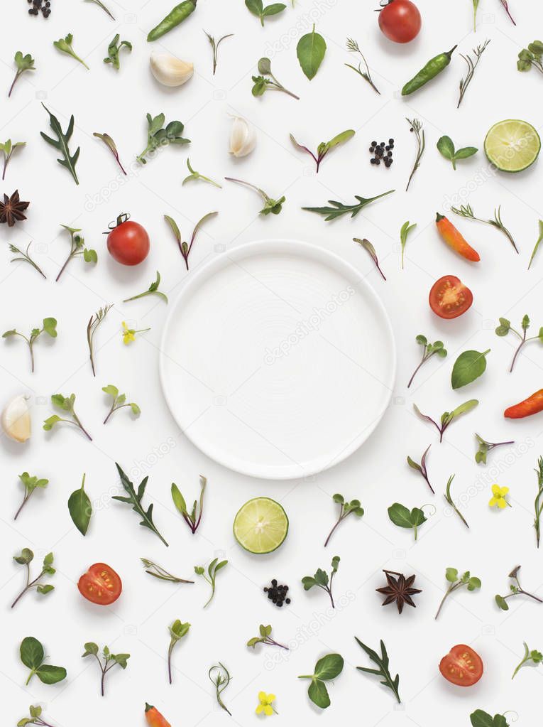Composition with dish, herbs, spices and vegetables