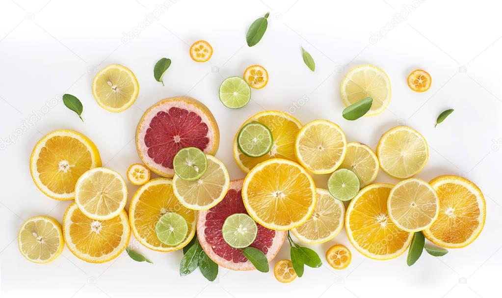 different halved fresh citrus fruits 