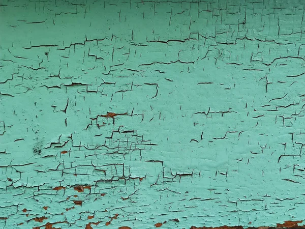 Texture on green blue wall. Old weathered paint