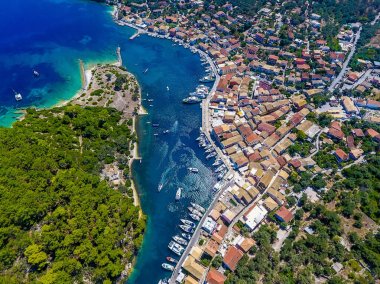 Gaios, capital city of Paxos Island near Corfu, aerial view. Gra clipart