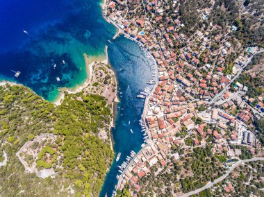 Paxos island from above. Aerial view of the small town Gaios, ca clipart