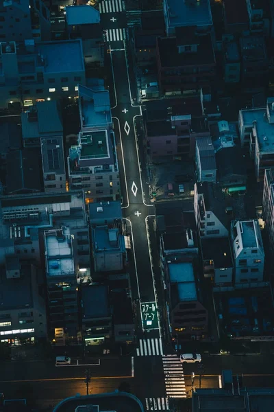 Tokyo city streets at night as seen from above aerial photography