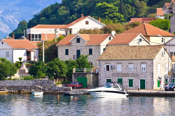 Mediterranean architecture houses with boat and sea Stock Image