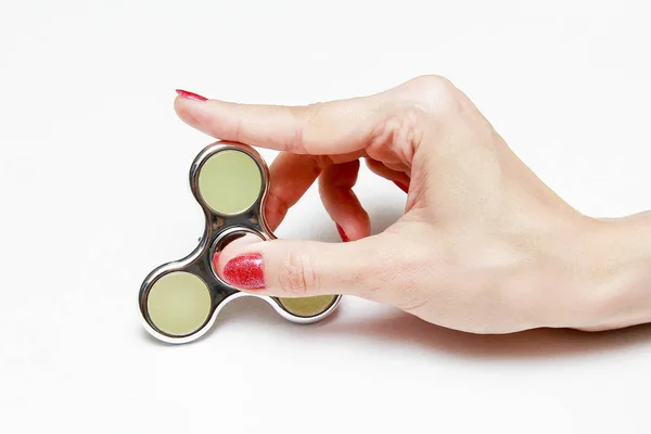 Spinner mano sobre un fondo blanco — Foto de Stock