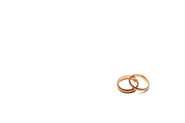 Gold wedding rings on white background — Stock Photo, Image