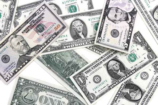 Dolarů bankovky na bílém pozadí — Stock fotografie